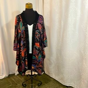 Rich colors against black open-front duster.